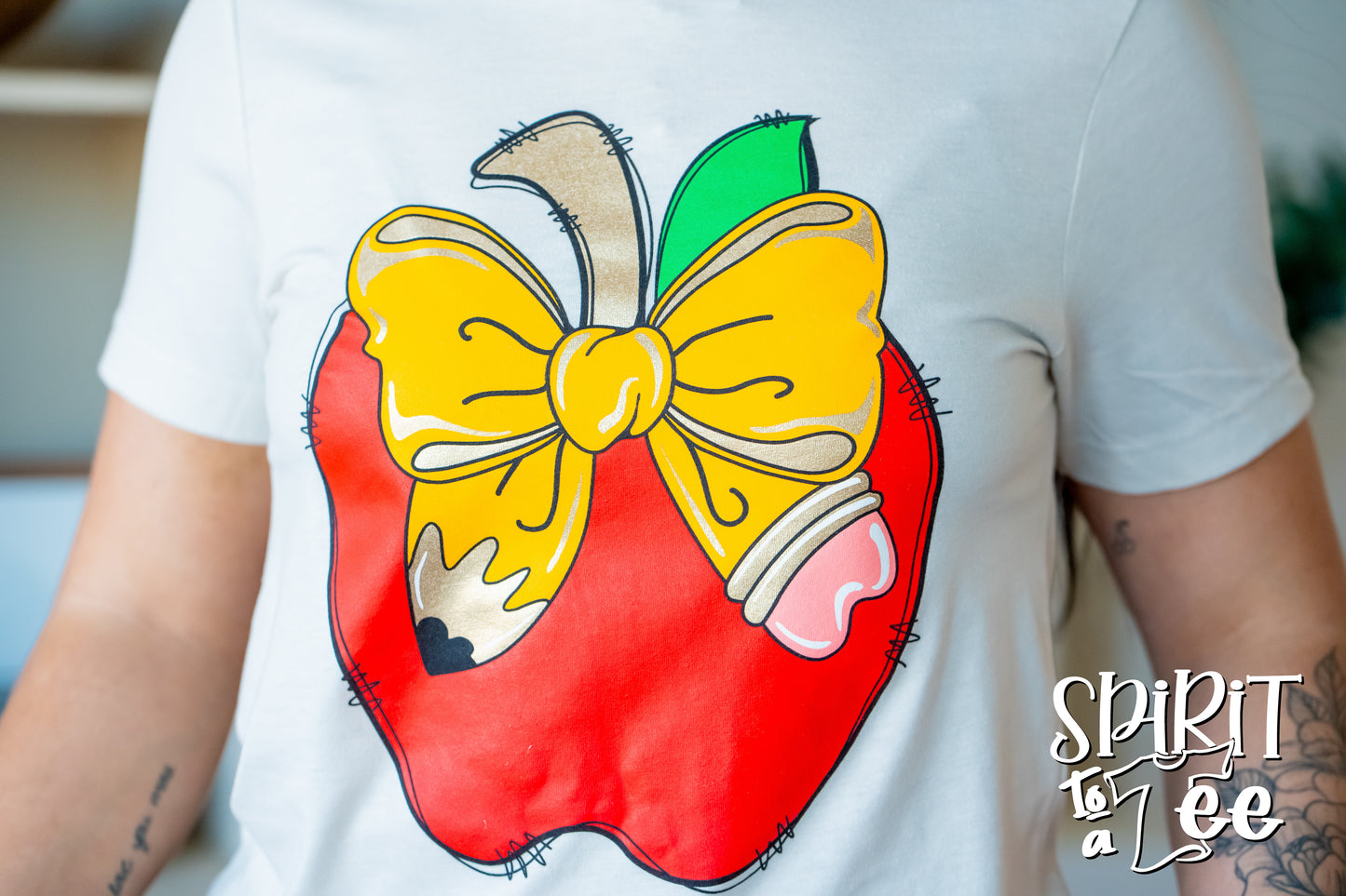 Teacher Apple with Pencil Bow Tee